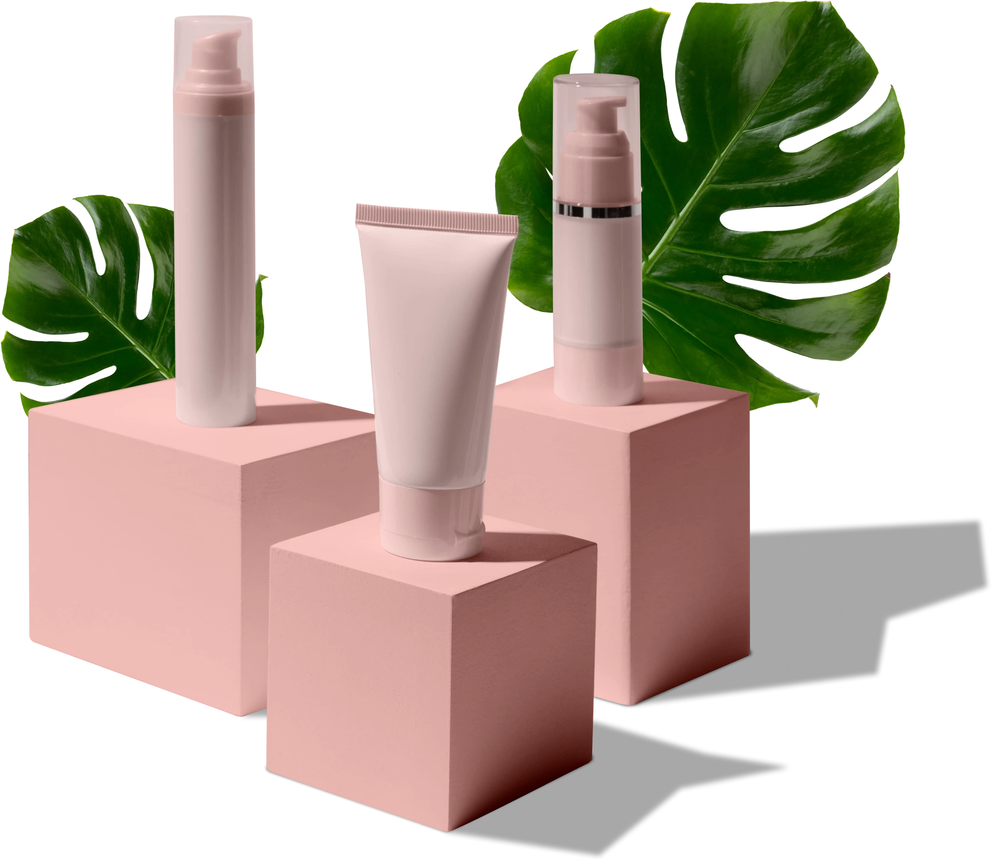 A pink cosmetic product with green leaves